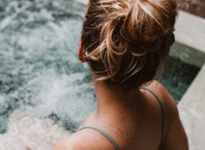 woman relaxing in a hot tub