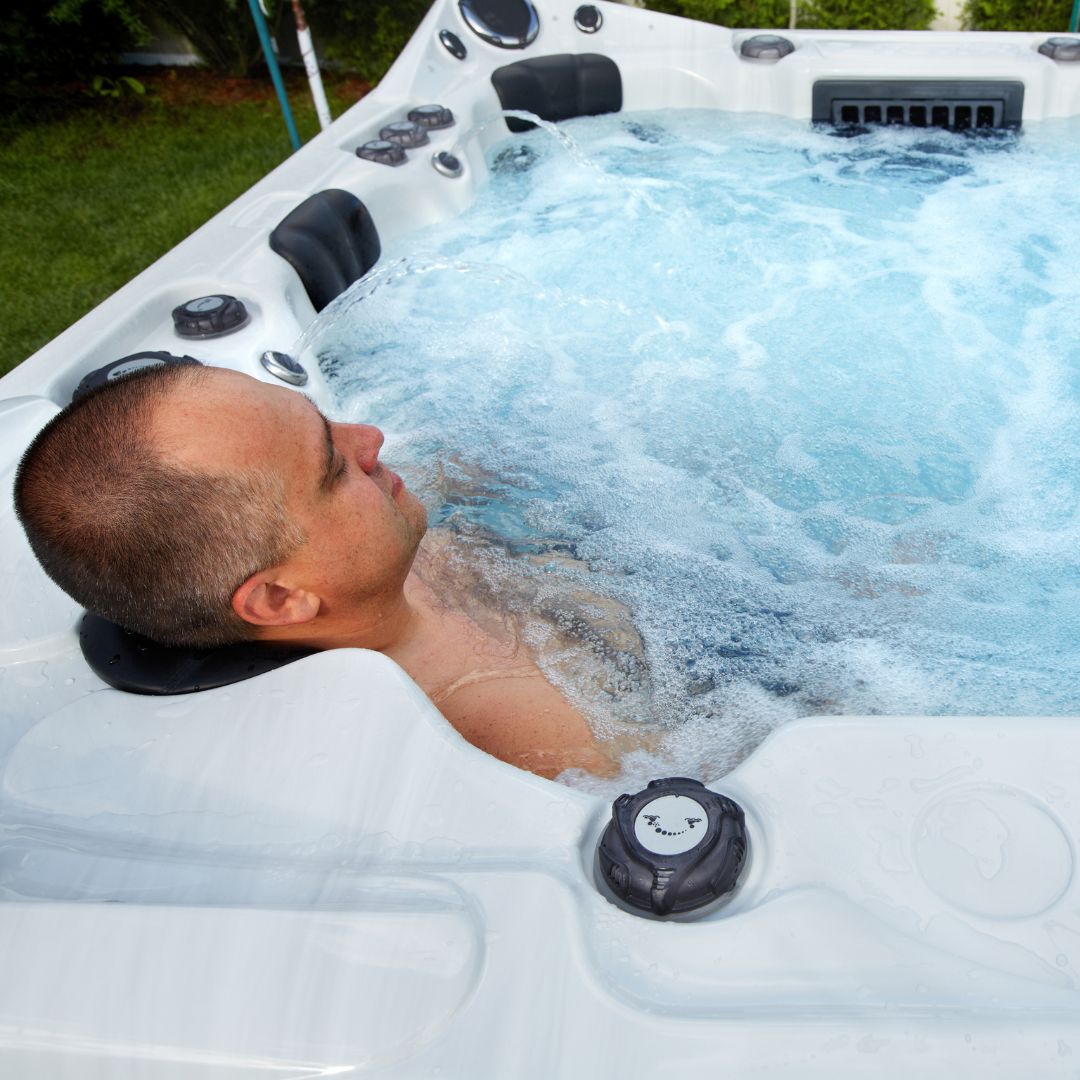 a man relaxing in a hot tub