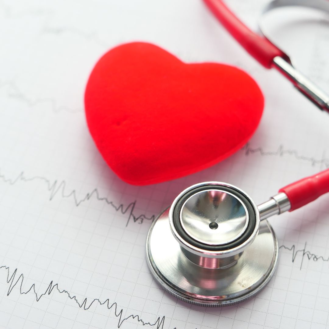 a toy heart and a stethiscope